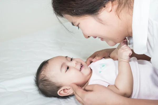 Picture of happy asian mother with adorable baby — Stock Photo, Image