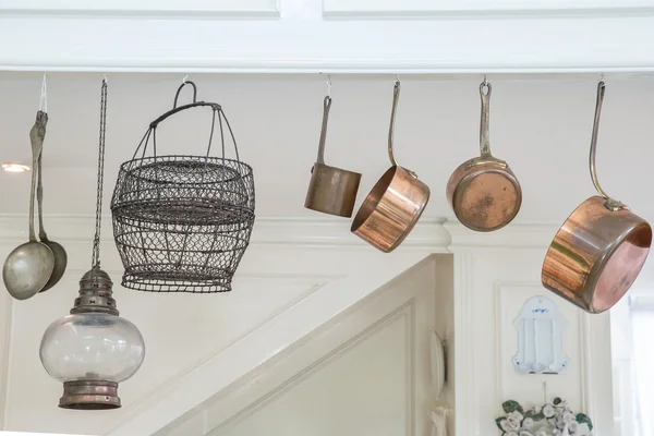 Kitchen utensils hanging in house — Stock Photo, Image