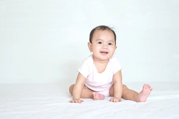 Asian cute girl baby is smiling in bedroom — Stock Photo, Image