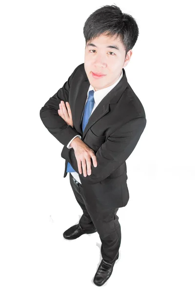Stnading asiatica giovane imprenditore e braccia incrociate. vista dall'alto (cli — Zdjęcie stockowe