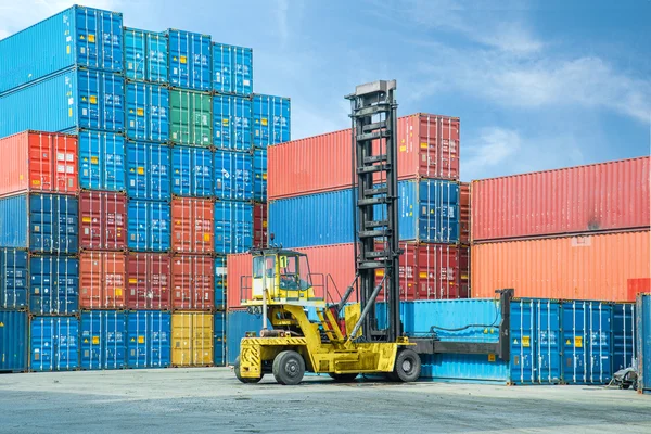 Crane lifter handling container box loading to depot — Stock Photo, Image