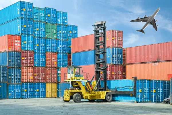 Crane lifter handling container box loading to truck — Stock Photo, Image