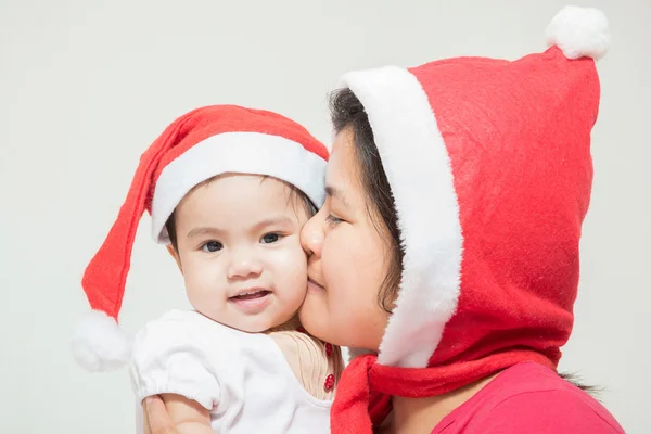 Happy cheerful family. Asian mother and baby kissing, laughing a — Stock Photo, Image