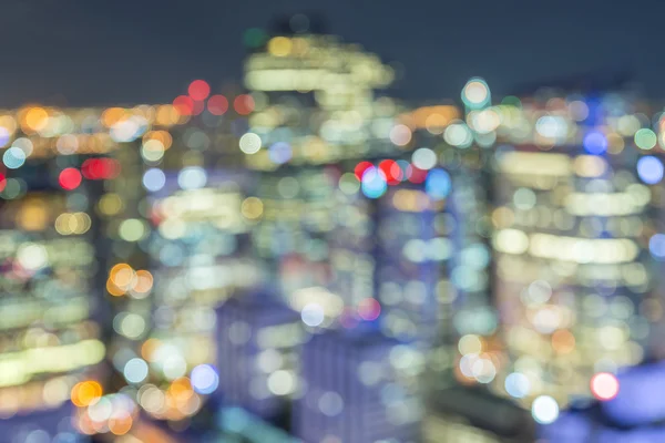 Bangkok skyline in de nacht, wazig foto bokeh — Stockfoto