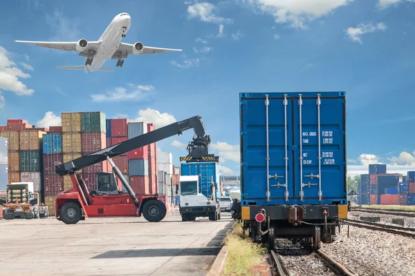 Forklift handling container box loading to freight train — Stock Photo, Image