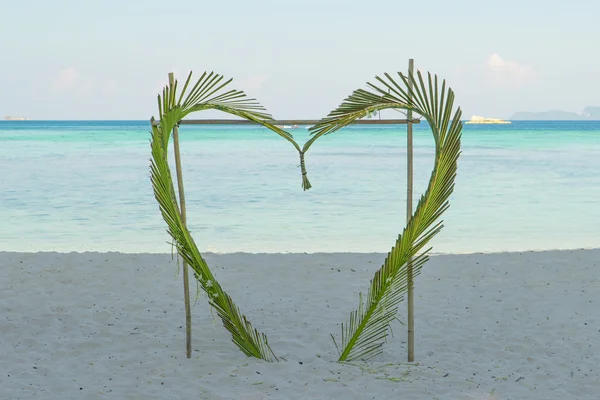 Coconut leaves heart in beach at Phuket, Thailand — Stock Photo, Image