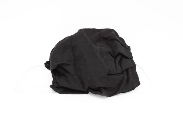 白い背景の黒い布のマスク — ストック写真