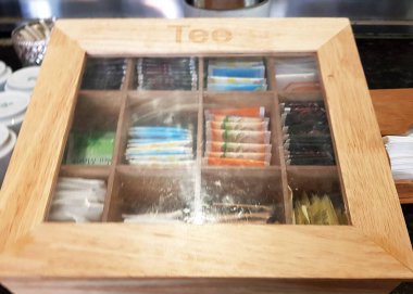 empty wooden table with coffee cups and white background