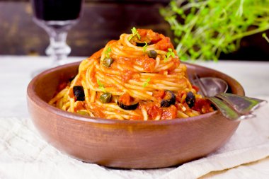 Spaghetti alla puttanesca (selective focus) clipart