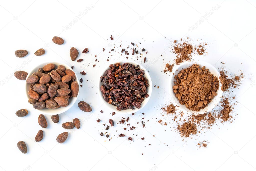 Cacao beans seeds, Cacao nibs and cacao powder isolated on white background.