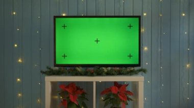 Yeşil ekran birleşik Noel televizyonu. TV ya da televizyon - yeşil ekran - masada. Noel zamanı