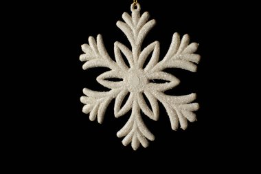 Siyah arka planda Noel kar taneleri. Yeni yıl ve Noel konsepti. İzole edilmiş. Yüksek kalite fotoğraf