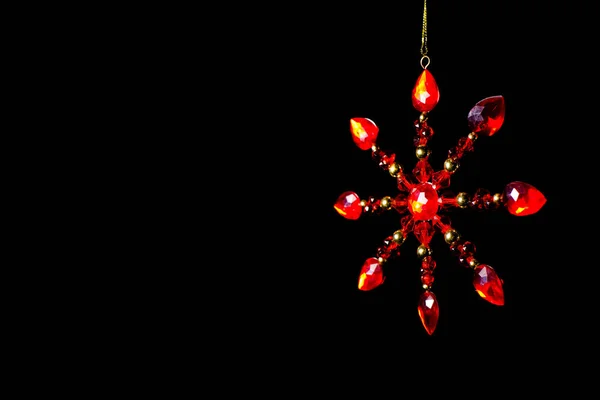 Egy Piros Karácsonyi Csillag Fekete Háttér — Stock Fotó