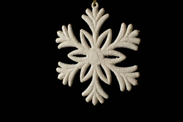 Siyah arka planda Noel kar taneleri. Yeni yıl ve Noel konsepti. İzole edilmiş. Yüksek kalite fotoğraf