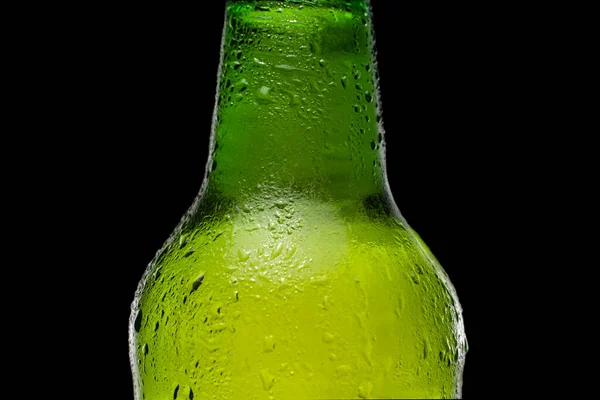 Green beer bottle with drops — Stock Photo, Image