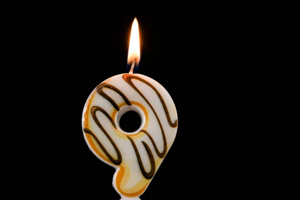 Vela de donut de aniversário. Número 9. Fundo preto — Fotografia de Stock
