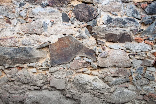 Alte Ruinen - Steinmauer mit sehr unterschiedlichem großen Stein — Stockfoto