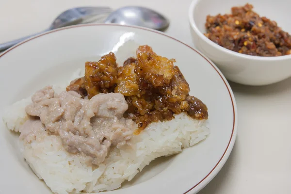 Sticky rice with fried pork and chili sauce — Stock Photo, Image