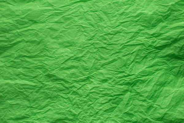 Green crepe paper background — Stock Photo, Image