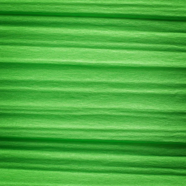 Green crepe paper background — Stock Photo, Image