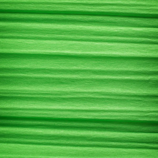 Green crepe paper background — Stock Photo, Image
