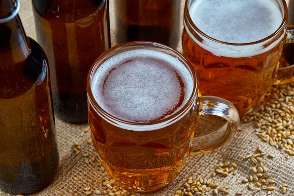 Glass and bottles of beer — Stock Photo, Image