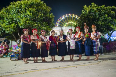 indigenous Mayan women with colorful typical costume with trees