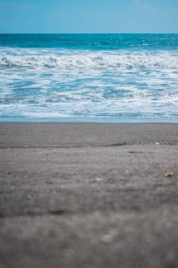 sand with sea in the background