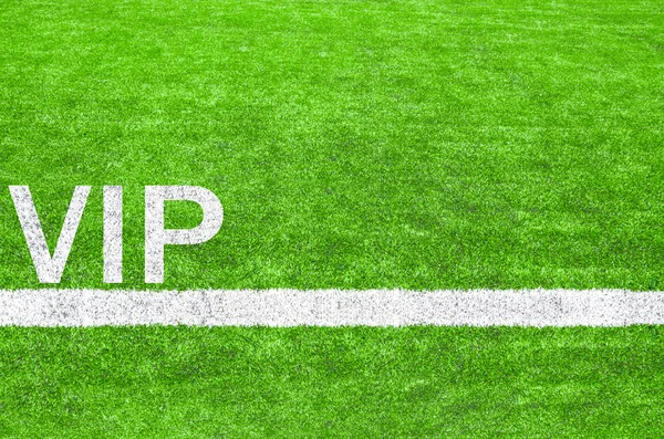 VIP символ на зеленому футбольному полі . — стокове фото