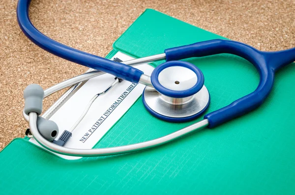 New patient record form with stethoscope medical. — Stock Photo, Image