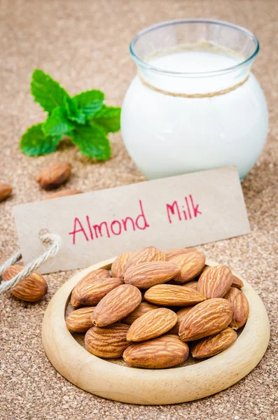 Almond and almond milk. — Stock Photo, Image