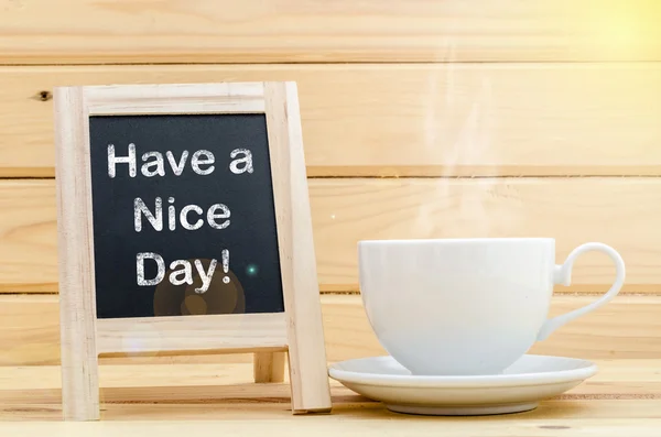 Have a nice day word on chalkboard and coffe — Stock Photo, Image