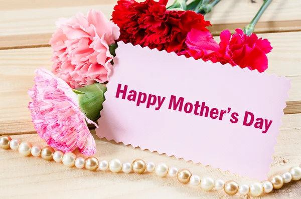 Mothers day message with pink carnations. — Stock Photo, Image