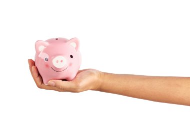 İnsan elini tutarak kumbara.