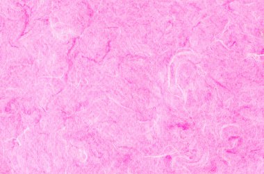 Arkaplan olarak pembe dut kağıdı dokusu.