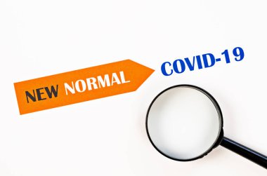 Kağıt üzerinde büyüteçle yeni bir normalin zamanı geldi. Salgın hastalıktan sonraki yaşam.