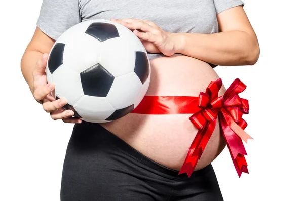 Pregnant woman holding football. expecting a boy Stock Photo