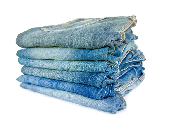 Lot of different blue jeans. — Stock Photo, Image