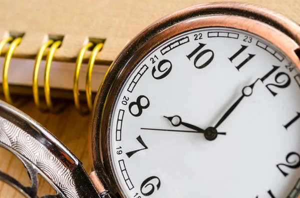 Diary with vintage clock — Stock Photo, Image