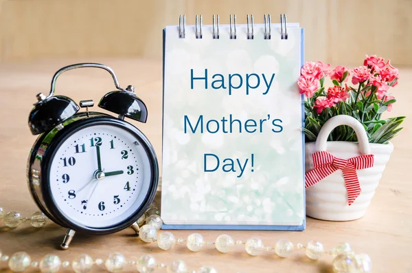 Mothers day card and alarm clock. — Stock Photo, Image