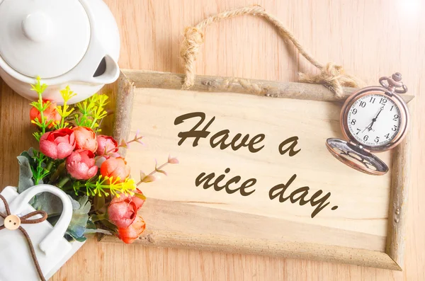 Have a nice day text in blank wooden photo frame — Stock Photo, Image