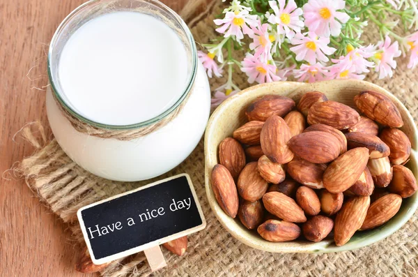 Have a nice day with almond and almond milk. — Stock Photo, Image