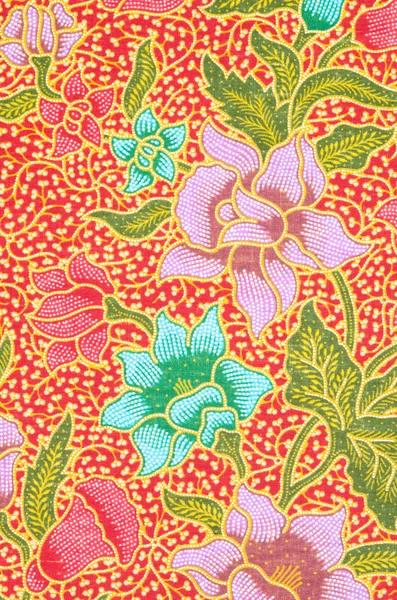 Blomma mönster bakgrund på batik tyg. — Stockfoto