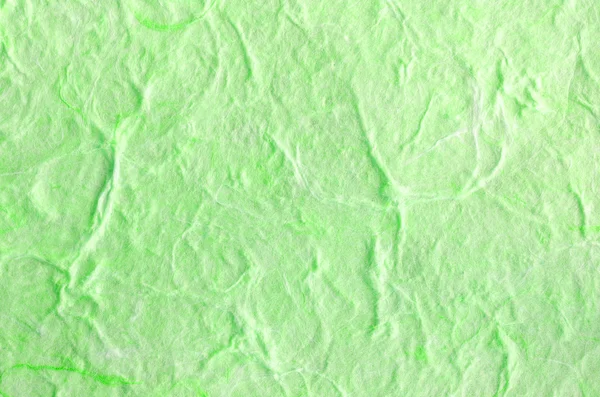 Зеленый бумажный фон со структурой волокна — стоковое фото