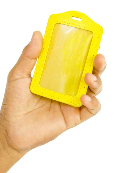 Hand hold Yellow leather tag — Stock Photo, Image