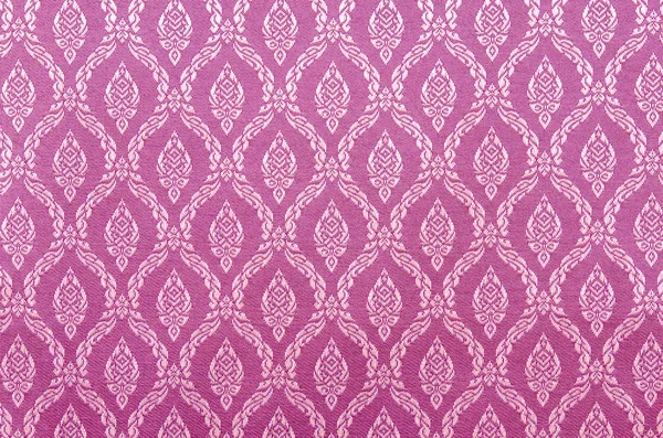 Arrière-plan de style thaï tissu rose . — Photo