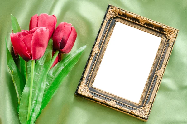 Blank Picture frames and red tulips flowers. — Stock Photo, Image