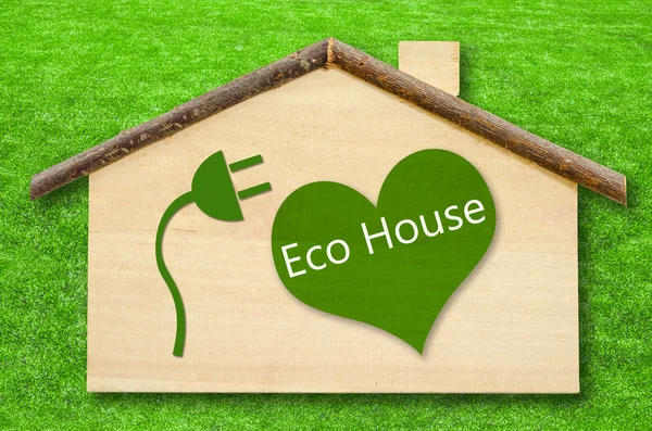 Eco house on Little home wooden model — Stock Photo, Image