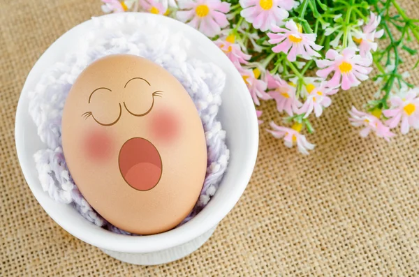 Egg in white bowl — Stock Photo, Image