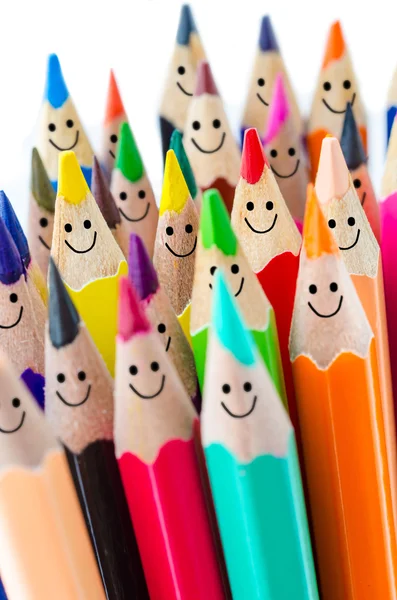 Färgglada pennor som leende ansikten. Royaltyfria Stockfoton